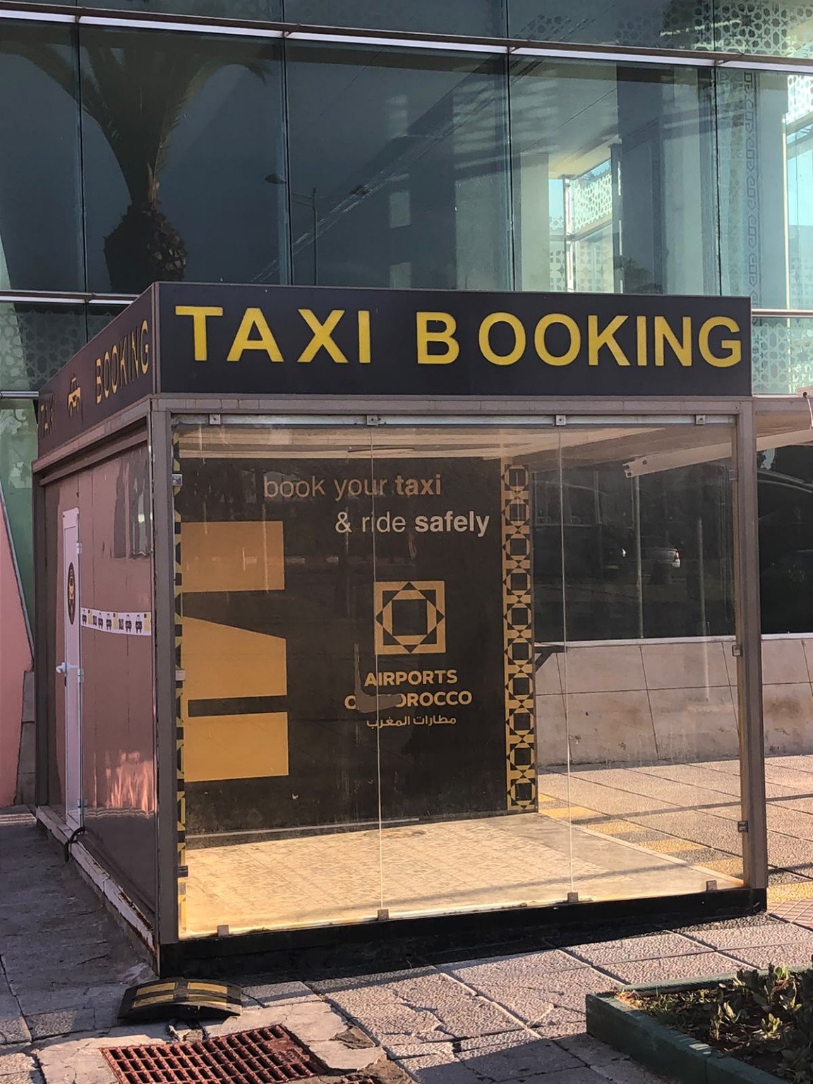 Signed Taxi Booking booth outside Tangier Airport